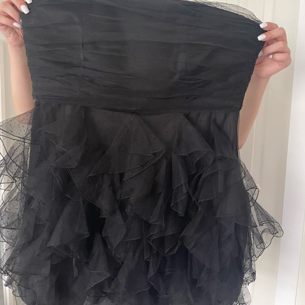 Pretty black  dress, which has been never worn.